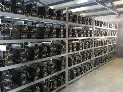 A modern mining farm with rows of ASIC miners humming.